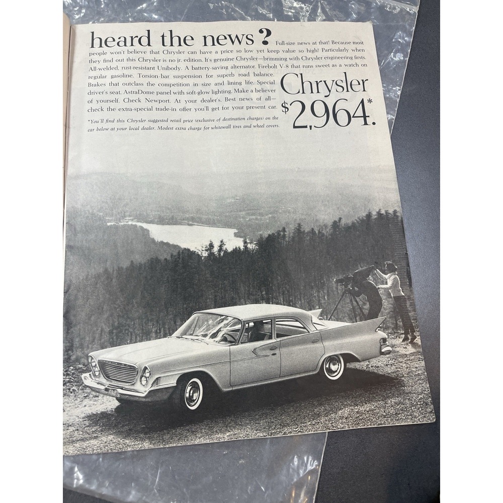 1961 Chrysler Newport large-mag car ad -"Heard the news? Chrysler $2,964."